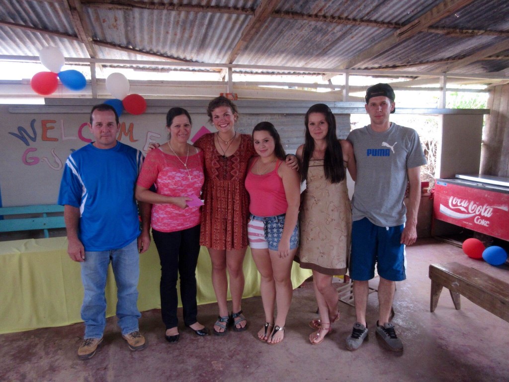 Sarah with her host family.