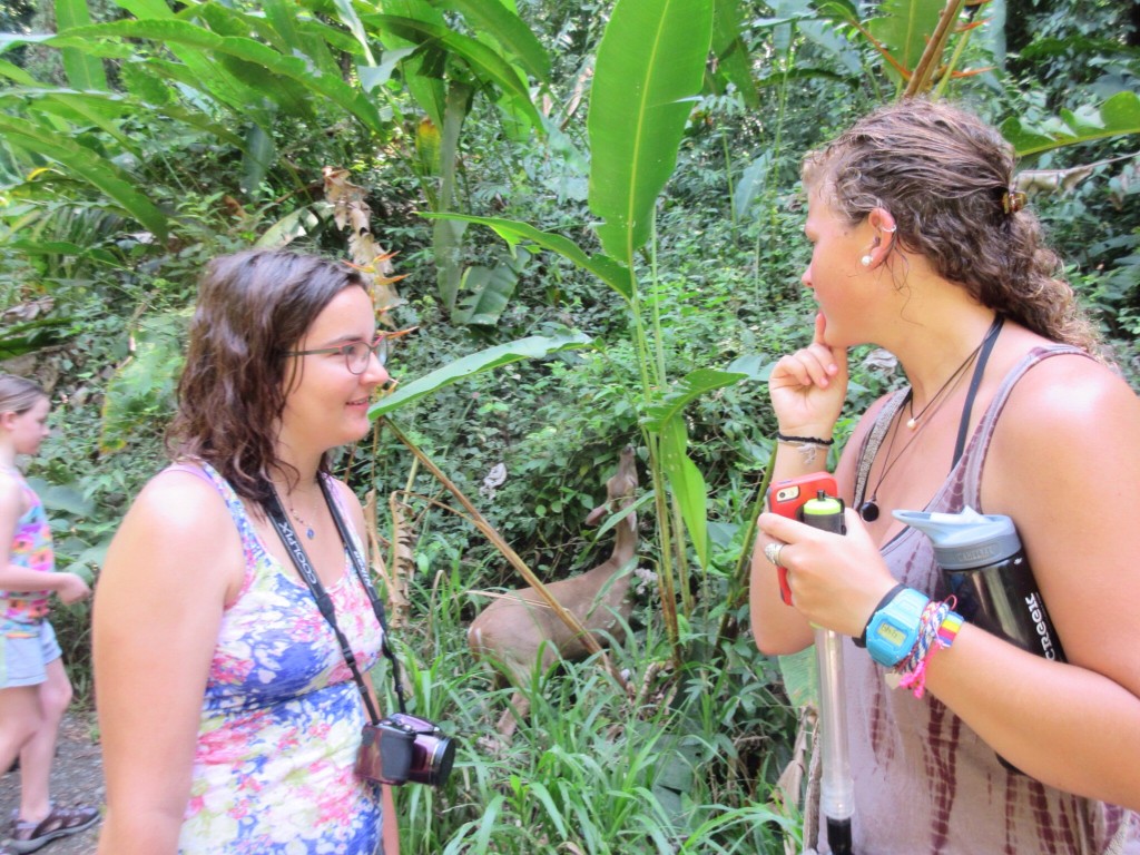 Mariah and Sarah pose "casually" with a trailside mini-deer.