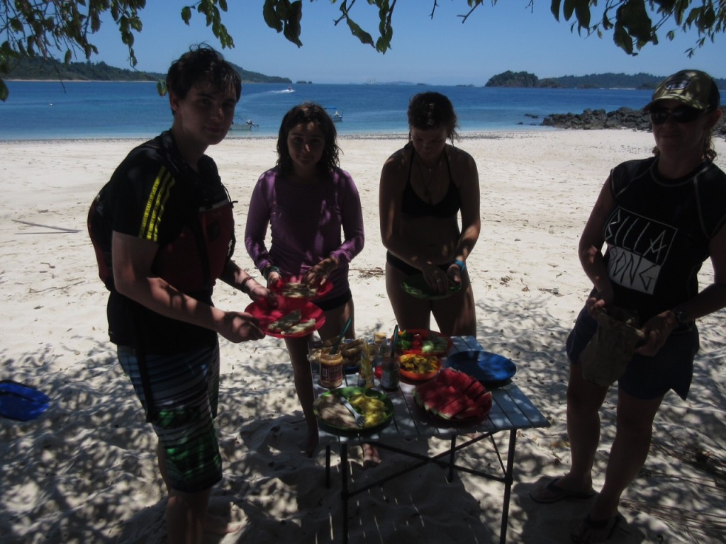Enjoying lunch by Liz (far right) on the beach!