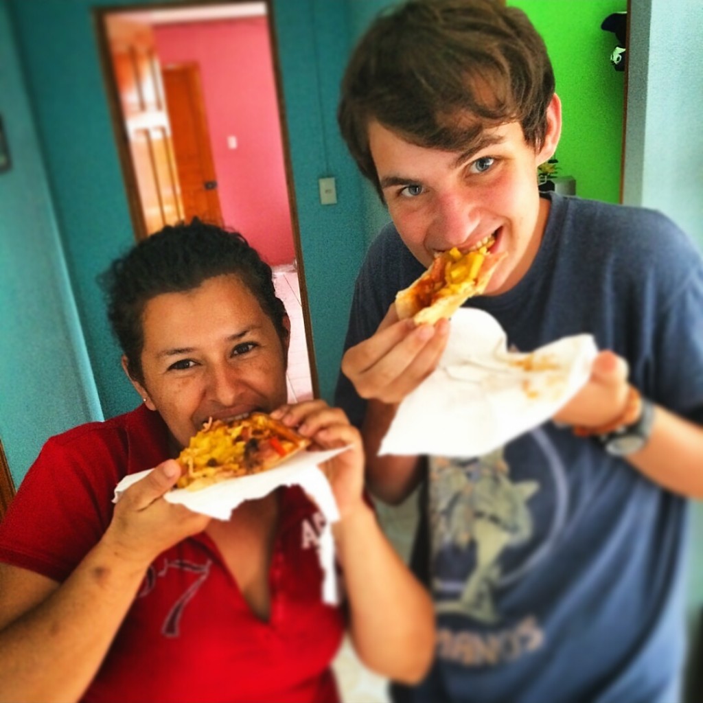 Jonah and Yancy eating the homemade pizza.